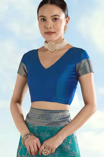 Rama banarasi silk blend jacuard work saree with unstitched blouse piece