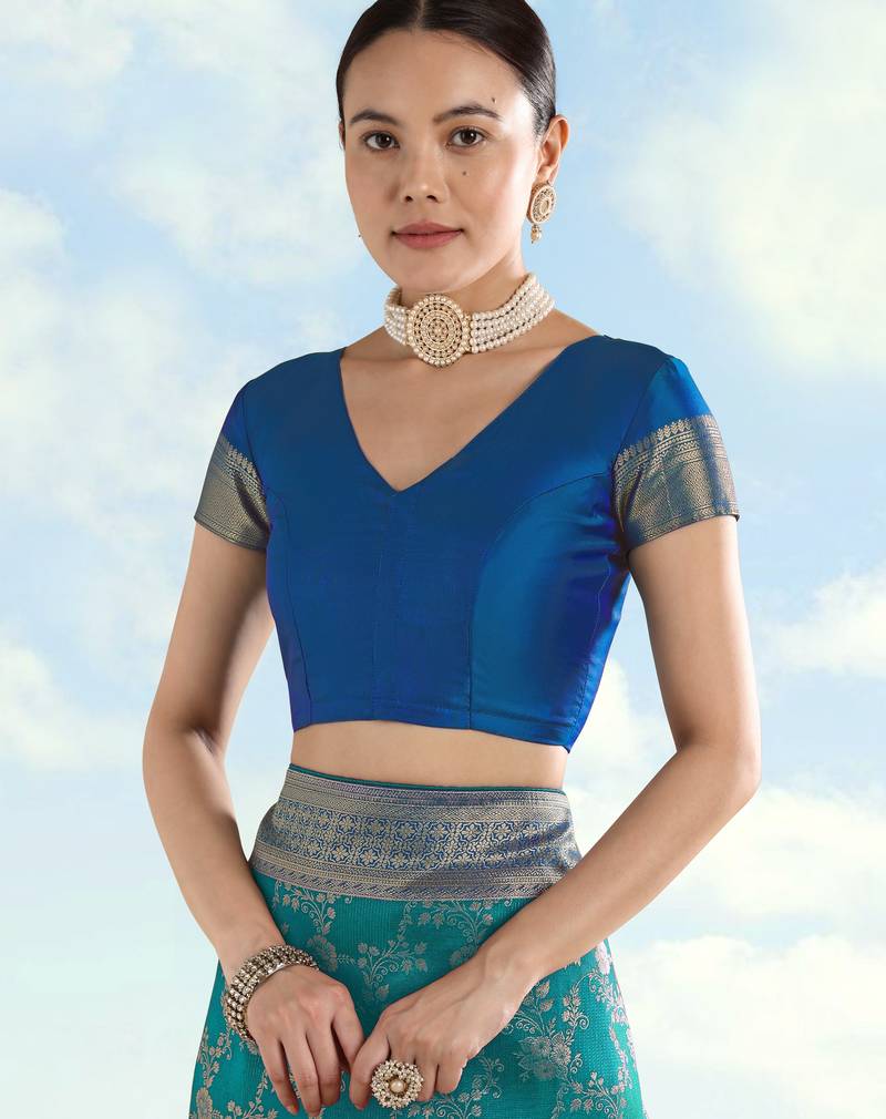 Rama banarasi silk blend jacuard work saree with unstitched blouse piece
