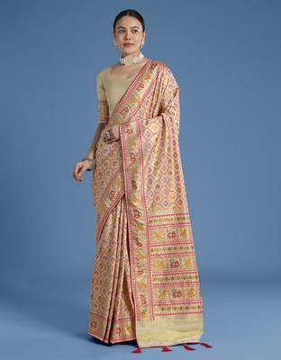 Cream banarasi silk blend jacuard work saree with unstitched blouse piece 1