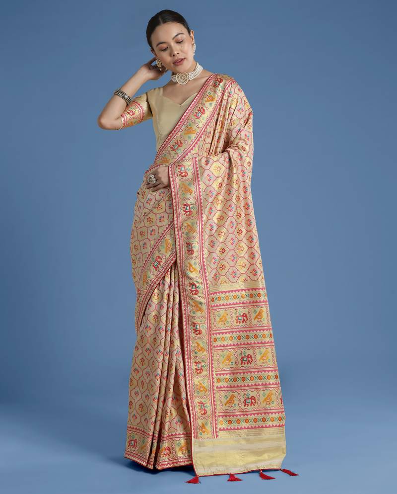Cream banarasi silk blend jacuard work saree with unstitched blouse piece