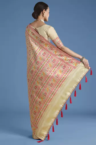 Cream banarasi silk blend jacuard work saree with unstitched blouse piece