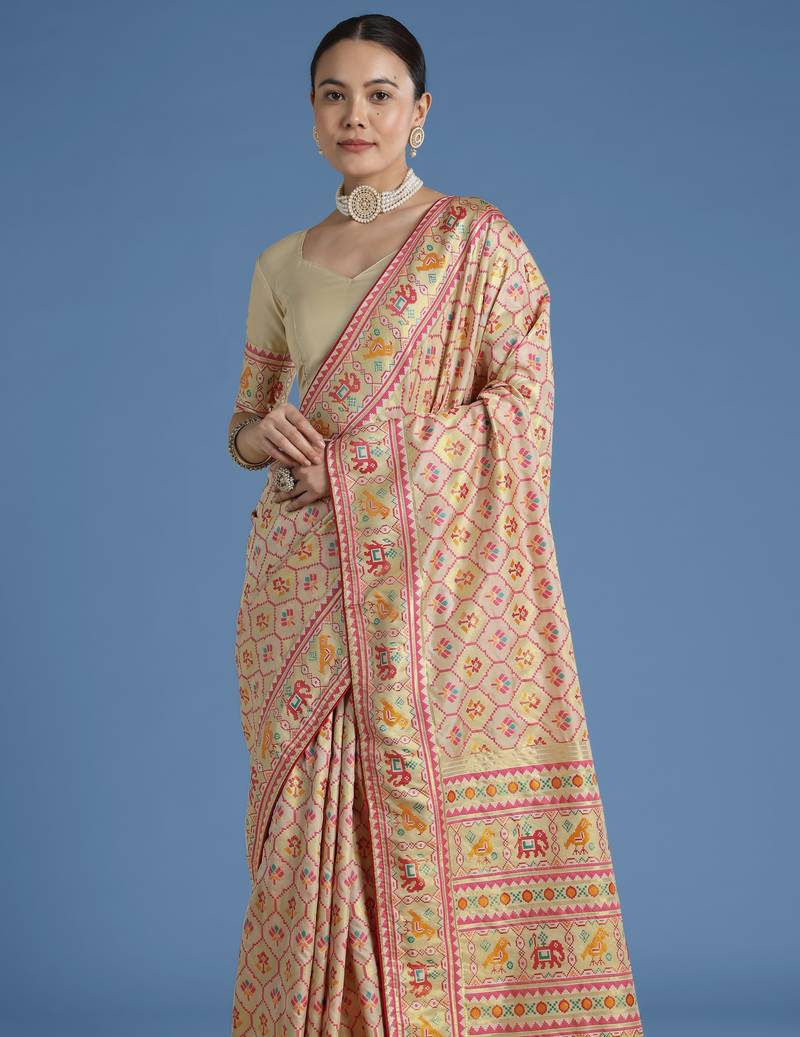 Cream banarasi silk blend jacuard work saree with unstitched blouse piece