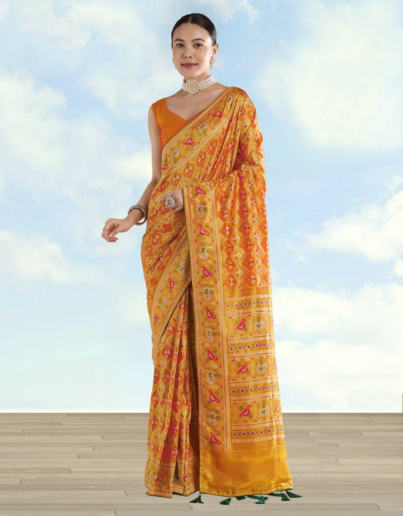 Yellow orange banarasi silk blend jacuard work saree with unstitched blouse piece