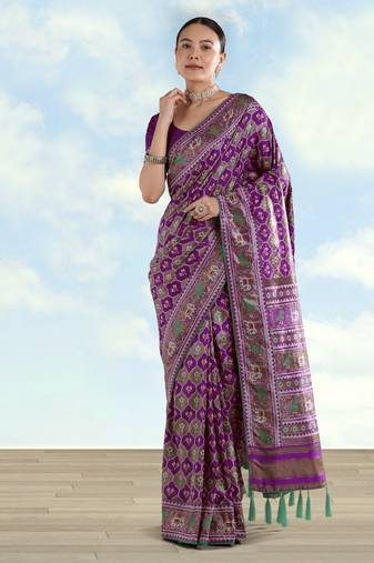 Purple banarasi silk blend jacuard work saree with unstitched blouse piece