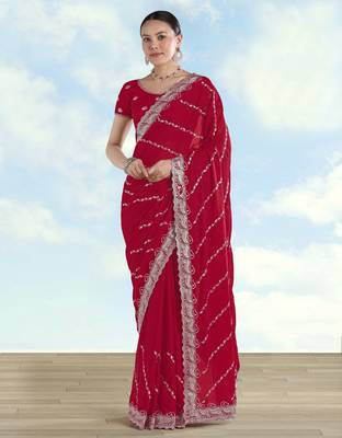Rani pink georgette embroidery work saree with unstitched blouse piece 1