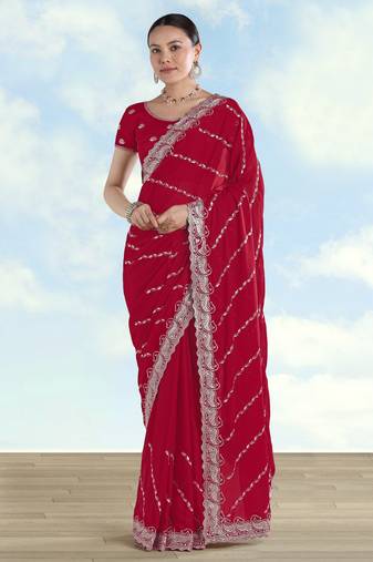 Rani pink georgette embroidery work saree with unstitched blouse piece