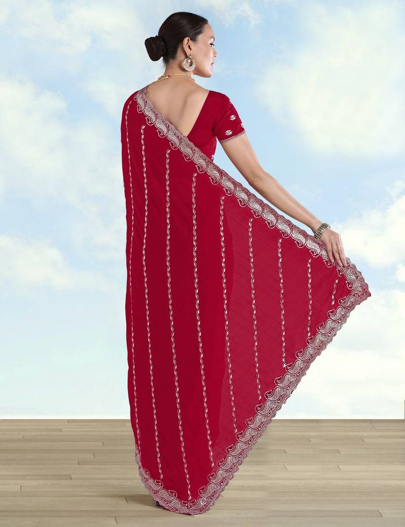 Rani pink georgette embroidery work saree with unstitched blouse piece