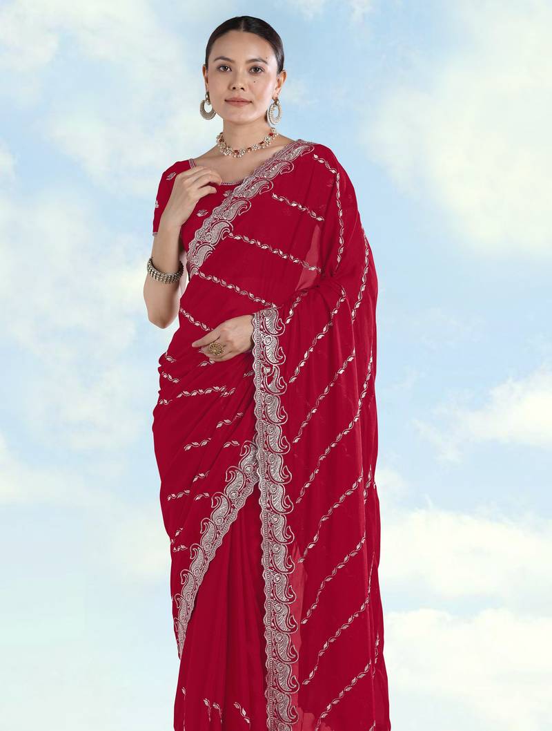 Rani pink georgette embroidery work saree with unstitched blouse piece