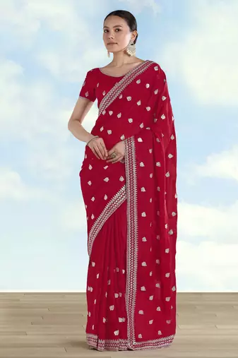Rani pink georgette embroidery work saree with unstitched blouse piece