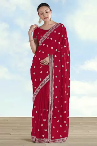 Rani pink georgette embroidery work saree with unstitched blouse piece