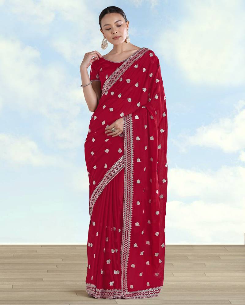 Rani pink georgette embroidery work saree with unstitched blouse piece