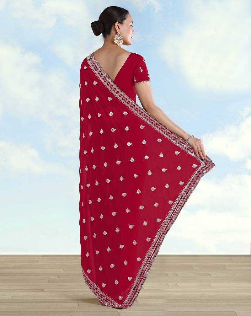 Rani pink georgette embroidery work saree with unstitched blouse piece