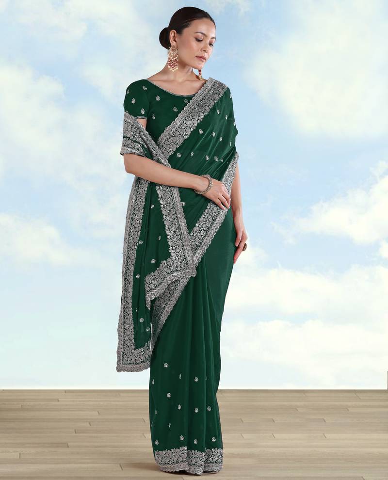 Green georgette embroidery work saree with unstitched blouse piece