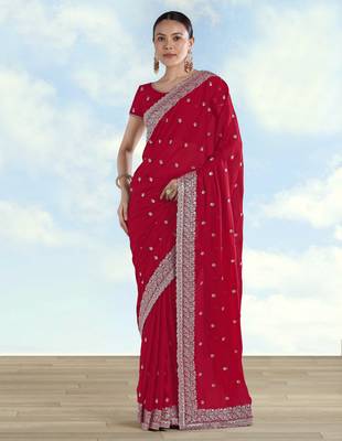 Rani pink georgette embroidery work saree with unstitched blouse piece 1