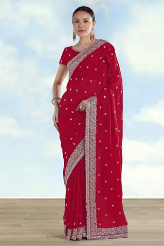 Rani pink georgette embroidery work saree with unstitched blouse piece