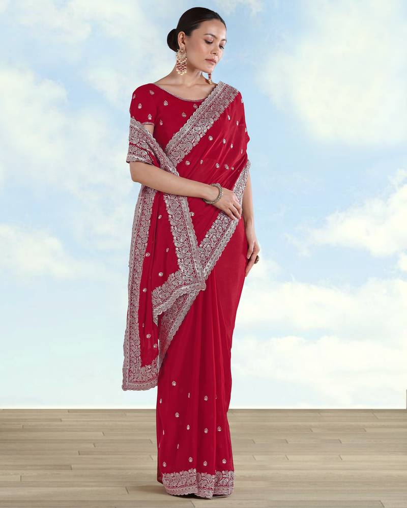Rani pink georgette embroidery work saree with unstitched blouse piece