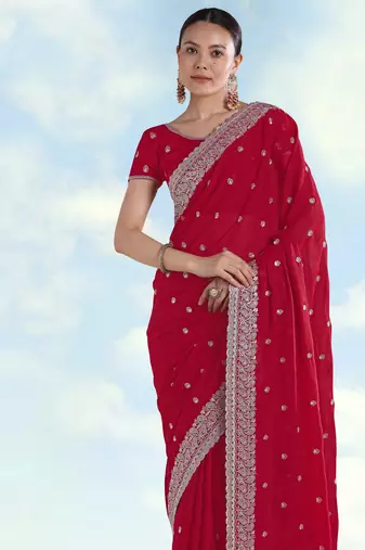 Rani pink georgette embroidery work saree with unstitched blouse piece