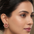 Traditional indian gold plated with white & pink  stones earrings