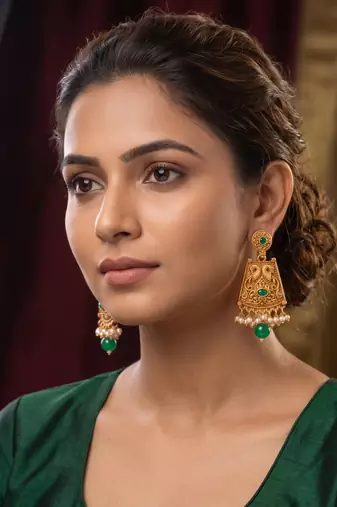Traditional indian gold  plated with  green  stones earrings