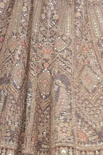 Embroidered Net Sequinned Semi-Stitched Lehenga & Unstitched Blouse With Dupatta