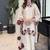 off white color embroidery sequence and multi work roman glass silk blend   kurta set