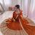 orange color codding sequence work roman silk blend   anarkali gown set