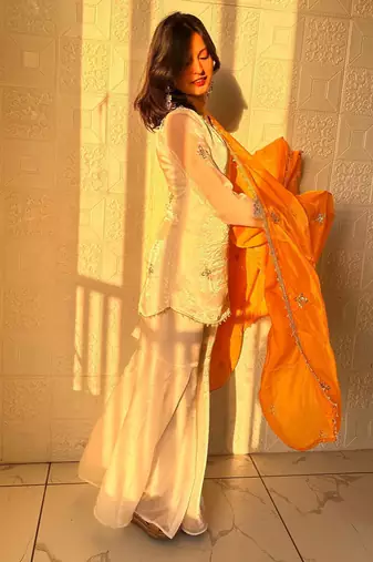 yellow color embroidery sequence work   silk blend   kurta set