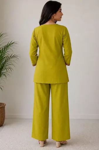 Women's daily wear stylish green embroidered cotton blend kurta with trouser set