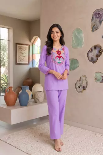 Women's daily wear stylish lavendar embroidered cotton blend kurta with trouser set