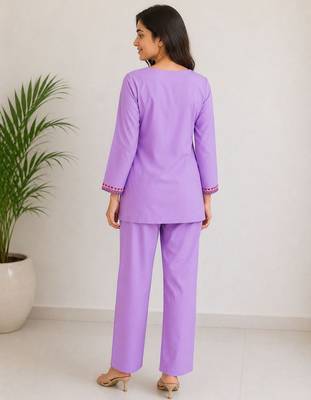 Women's daily wear stylish lavendar embroidered cotton blend kurta with trouser set 3
