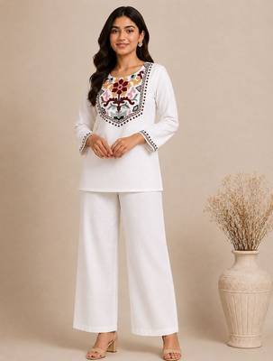 Women's daily wear stylish off-white embroidered cotton blend kurta with trouser set 1