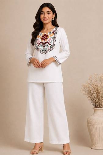 Women's daily wear stylish off-white embroidered cotton blend kurta with trouser set