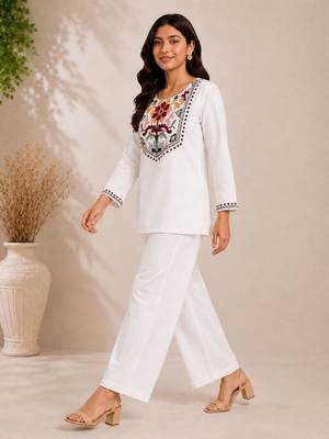 Women's daily wear stylish off-white embroidered cotton blend kurta with trouser set 2