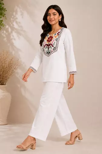 Women's daily wear stylish off-white embroidered cotton blend kurta with trouser set
