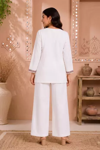 Women's daily wear stylish off-white embroidered cotton blend kurta with trouser set