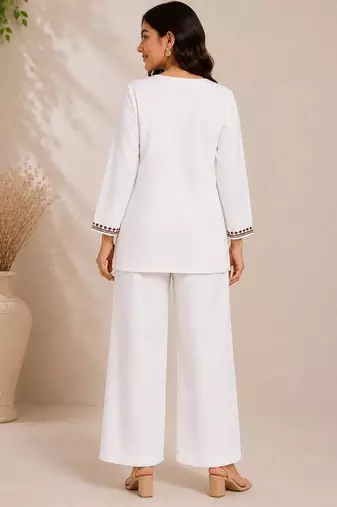Women's daily wear stylish off-white embroidered cotton blend kurta with trouser set
