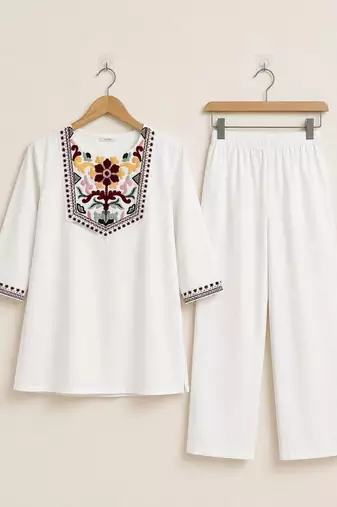 Women's daily wear stylish off-white embroidered cotton blend kurta with trouser set
