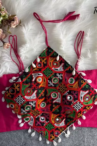 Rani pink navratri noodle strap cotton blouse with hand mirror & kaudi work