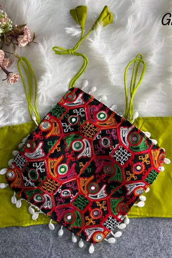 Green navratri noodle strap cotton blouse with hand mirror & kaudi work