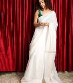White & cream-coloured embellished sequinned handloom saree
