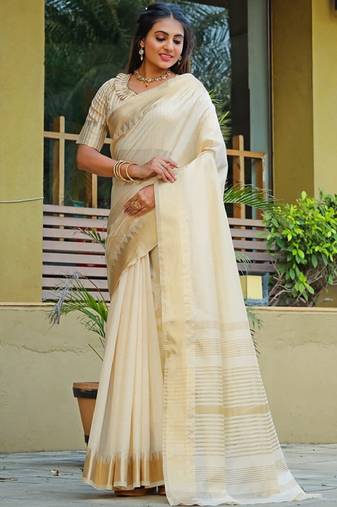 Cream ethnic motifs woven design zari silk cotton banarasi saree