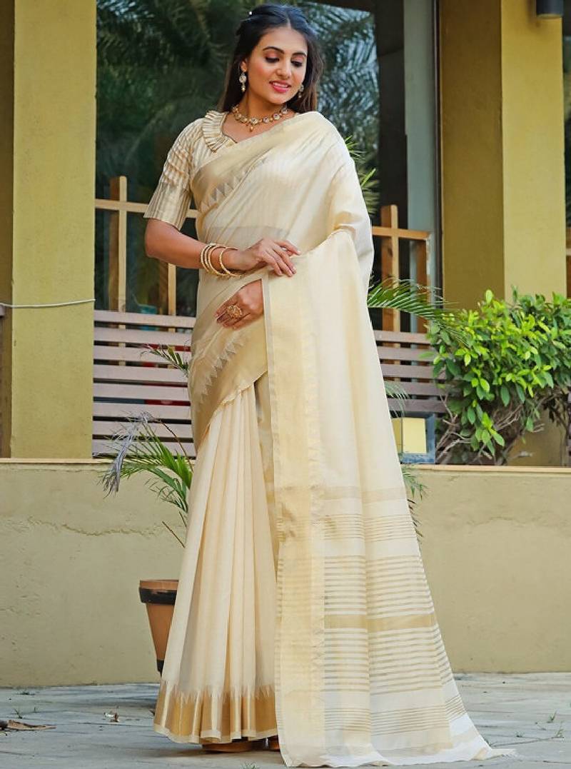 Cream ethnic motifs woven design zari silk cotton banarasi saree