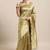 Cream-coloured & gold-toned woven design zari silk blend banarasi saree