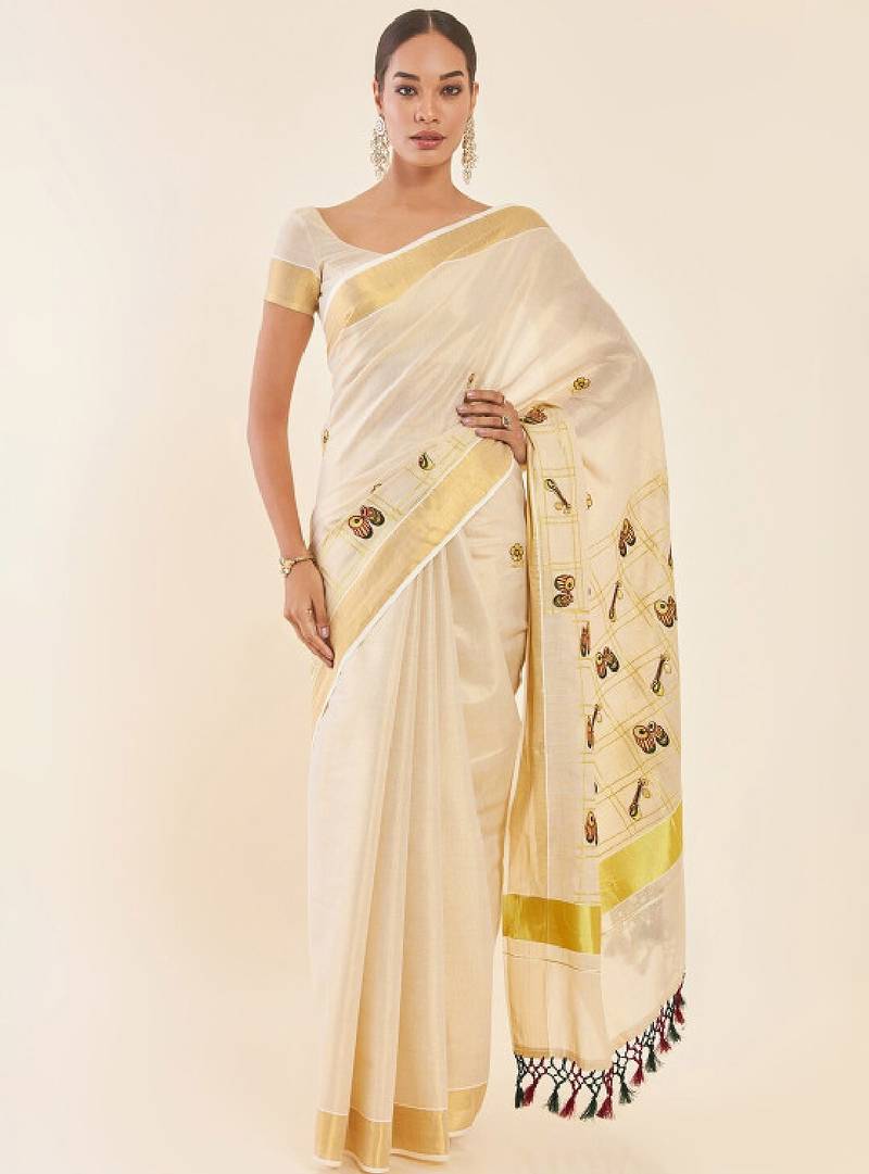 Off white ethnic motifs printed zari tissue kasavu saree
