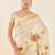 Off white ethnic motifs printed zari tissue kasavu saree
