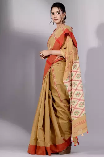 beige and green woven design tissue saree