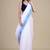 Women white & blue woven design zari jute silk jamdani saree