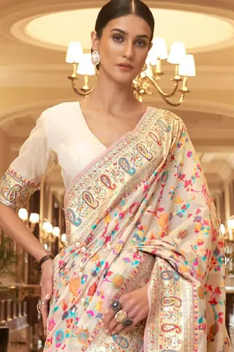 cream and blue silk blend paithani saree with floral zari design