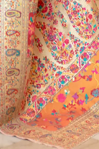 cream and blue silk blend paithani saree with floral zari design