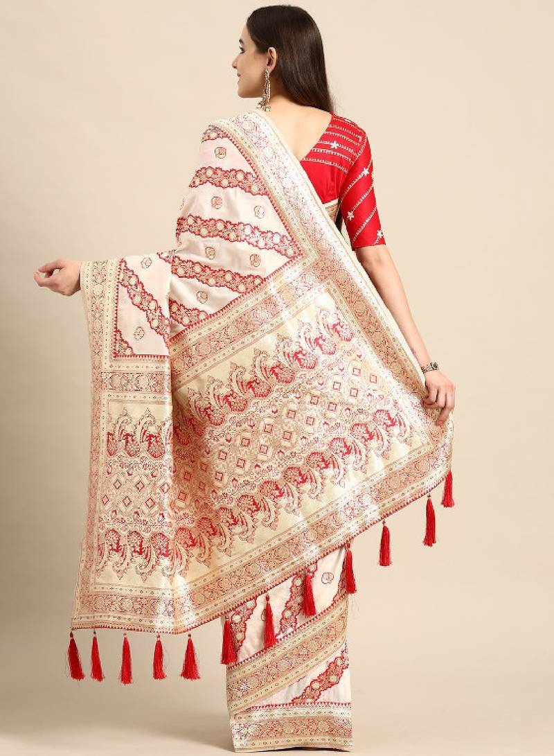 off white silk blend banarasi saree with heavy leheriya work